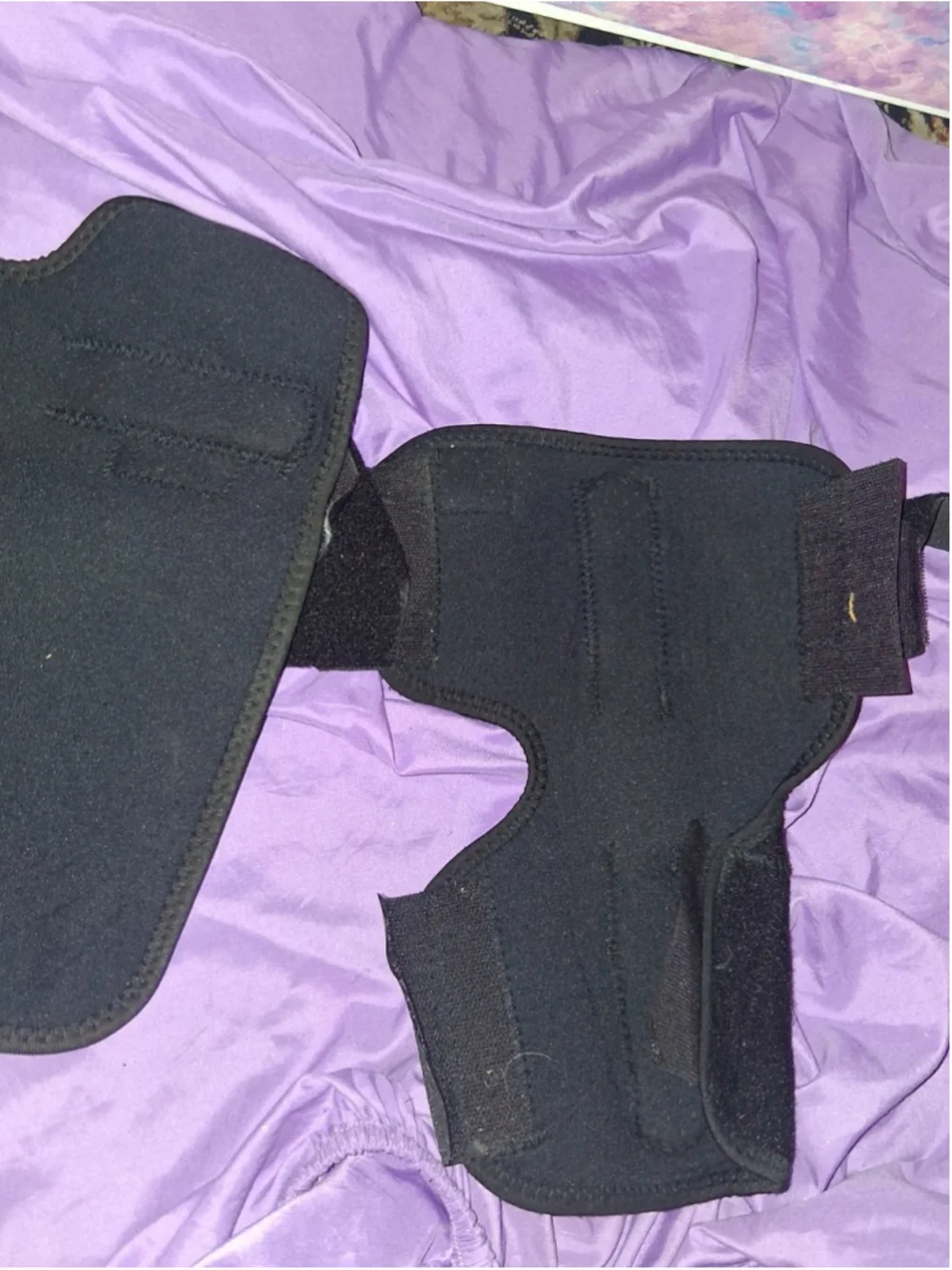 black ProLine Innovations PL-32/33 knee support brace with dual hinges, neo